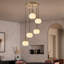 Lustre 5 lumières en laiton brossé
