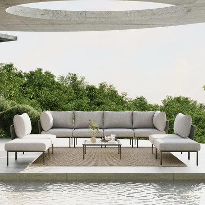 Ensemble de meubles de patio en aluminium 9 pièces Latitude Run®, canapé modulaire moderne avec table basse et coussin épais