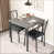 Table grise / chaise noire est en rupture de stock