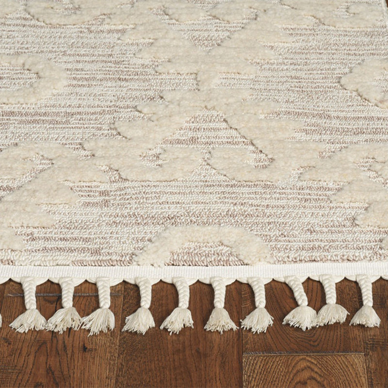 Tapis ivoire à losanges beiges avec franges
