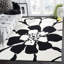 Tapis noir / blanc en laine touffeté à la main Colette-386885297