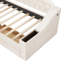 Lit de jour simple beige avec rangement pour accoudoirs et bloc d'alimentation fonctionnel