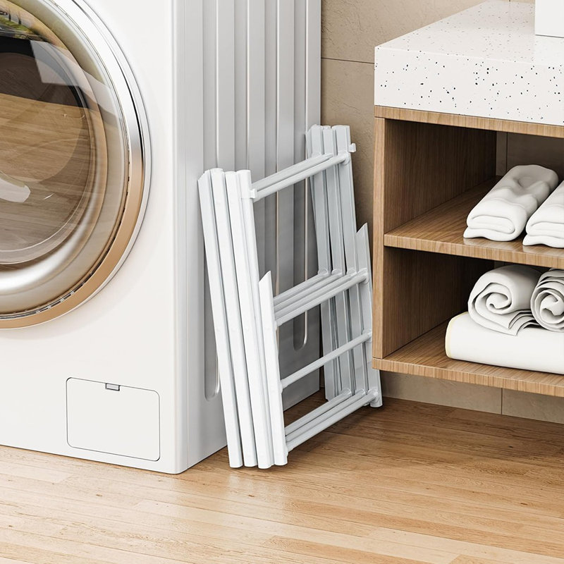 Séchoir à linge pliable à 3 niveaux, couleur blanche, support à linge portatif pour la lessive, structure en métal antirouille pliable, conception peu encombrante, style utilitaire contemporain