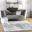 Tapis performance gris / blanc moderne à motif abstrait tissé à la machine Deedra-79593280