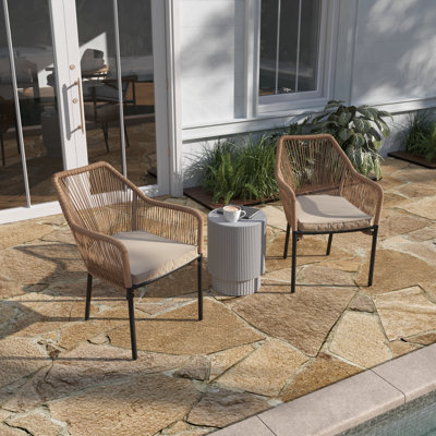 Kyla Metal Outdoor Stackable Dining Armchair with Cushion by Taylor & Logan