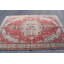 Grand tapis turc rose antique idéal pour ajouter une touche rétro à votre salon