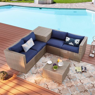 Alvin 4 Piece Rattan Sectional Seating Group with Cushions by Sand & Stable