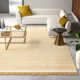 Cierra Solid Color Hand Braided Wool Area Rug in Light Beige