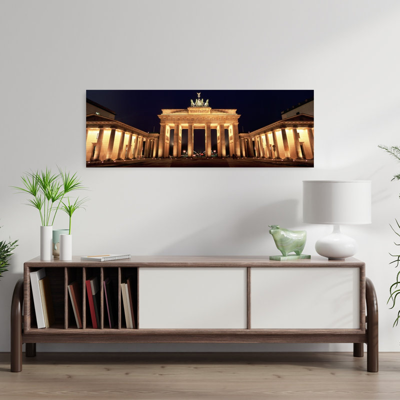 Low Angle View Of A Gate Lit Up At Night Brandenburg Gate Berlin Germany by Bruno Perousse - Wrapped Canvas Panoramic Print