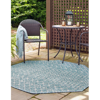 Tapis intérieur / extérieur bleu / beige Kimber Southwestern