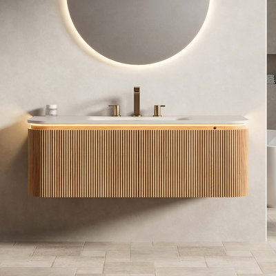 Meuble-lavabo flottant avec lavabo intégré en pierre frittée et éclairage à capteur