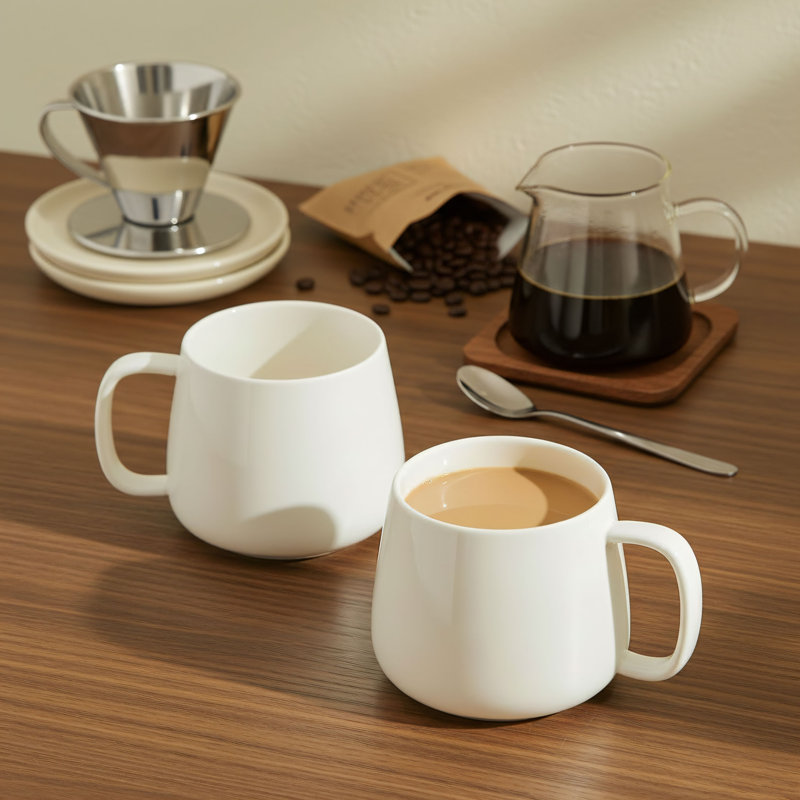 Ensemble de tasses à café 16 oz en céramique blanche (4 pièces), compatible avec les tasses à café au lait empilables, au micro-ondes, au lave-vaisselle et au four. Cadeau de pendaison de crémaillère idéal.
