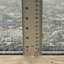 Tapis oriental en polyester tissé à la machine Andreana en beige / bleu / gris-757547374
