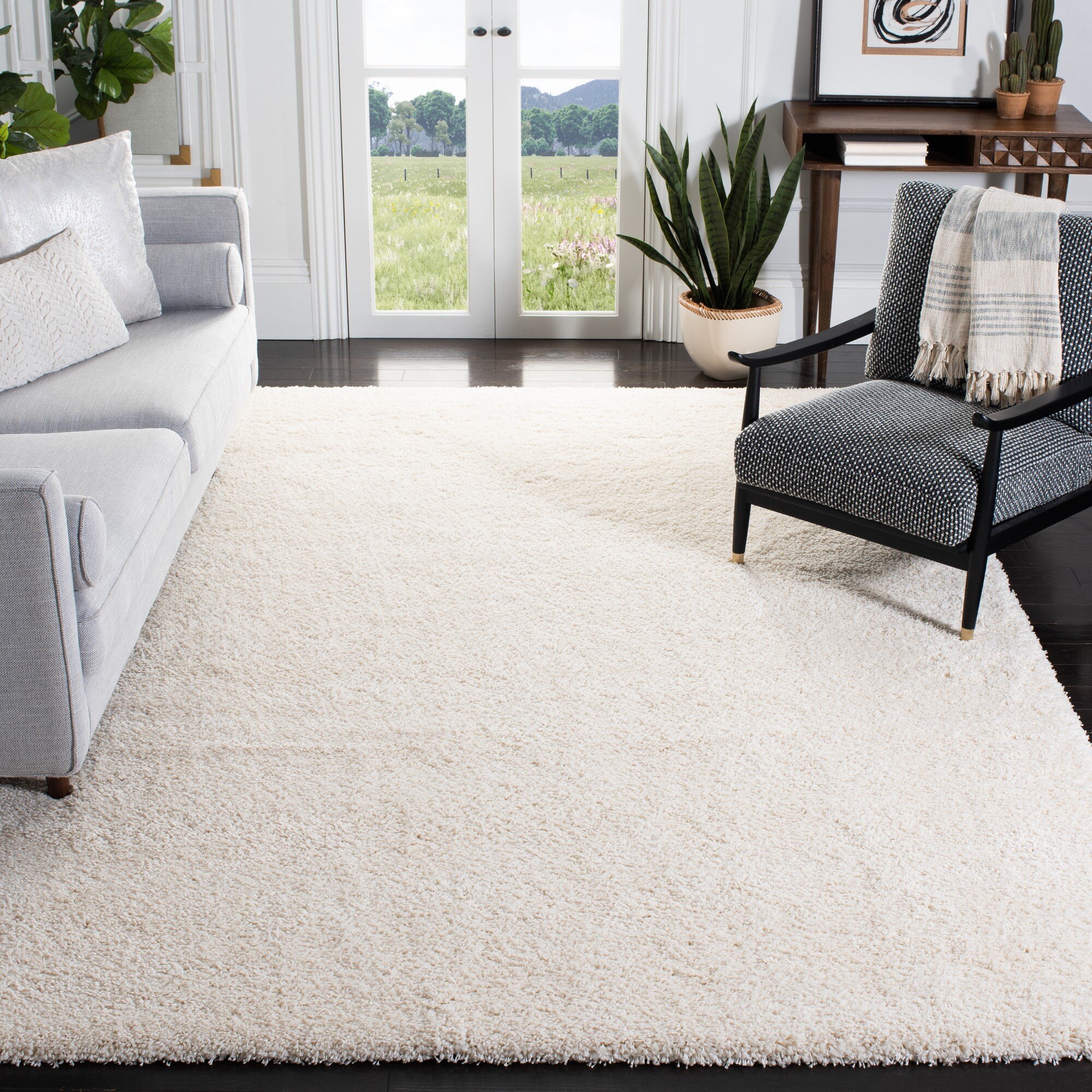 https://assets.wfcdn.com/im/39172954/compr-r85/1321/132165637/irmtrud-polypropylene-blend-ivory-rug.jpg