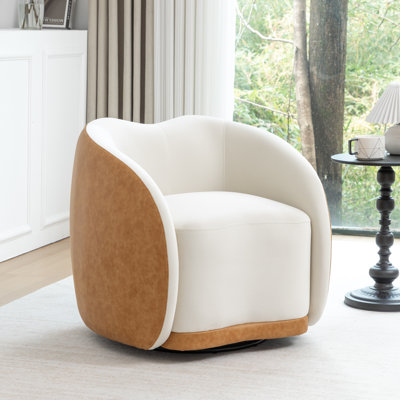 Aastha Velvet Upholstered Swivel Barrel Chair