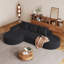 Élégant canapé arrondi en chenille haute résilience et assise très large pour une détente confortable