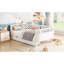 Lit simple blanc pour et, avec beaucoup de rangement, tête de lit à profil bas, une belle plateforme de sommeil, design, avec clôture à tiroirs de rangement, différents styles de pièces