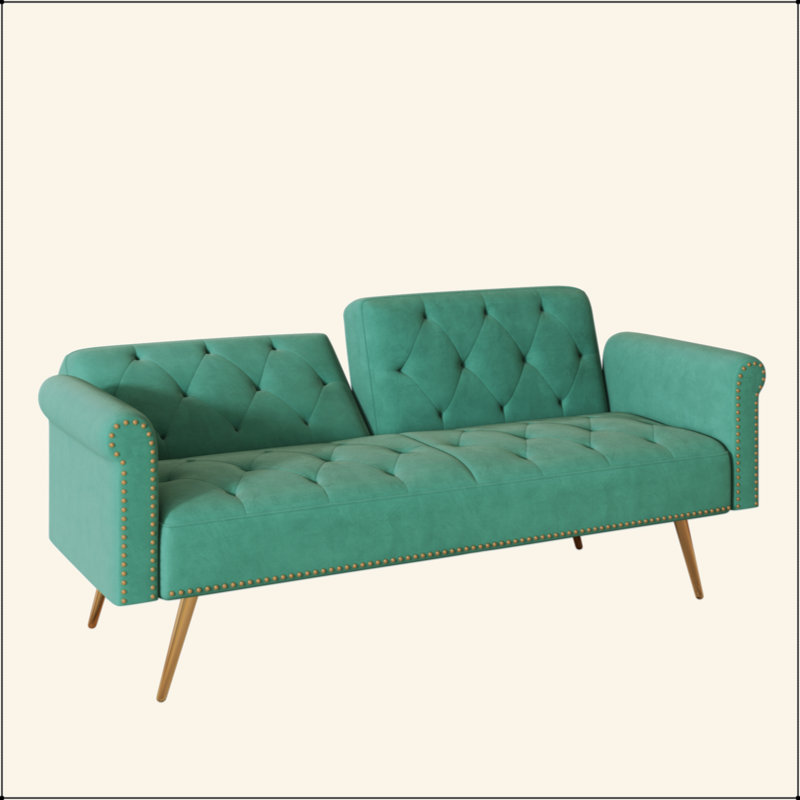 Un canapé-lit de 69,7 pouces de long recouvert de tissu de velours, avec une garniture cloutée et un coussin décoratif assorti