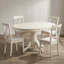 Ensemble de salle à manger ovale 5 pièces en hévéa massif blanc lin avec chaises à dossier croisé en forme de feuille de papillon et piètement central