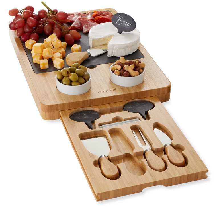 https://assets.wfcdn.com/im/39191465/resize-h755-w755%5Ecompr-r85/2500/250082517/Bamboo+Cheese+Board+Gift+Set+With+Slate+Tray%2C+4+Knives%2C+2+Dip+Bowls.jpg