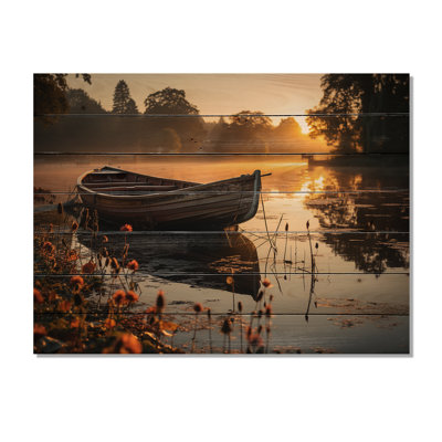 Canot sur le lac sur bois