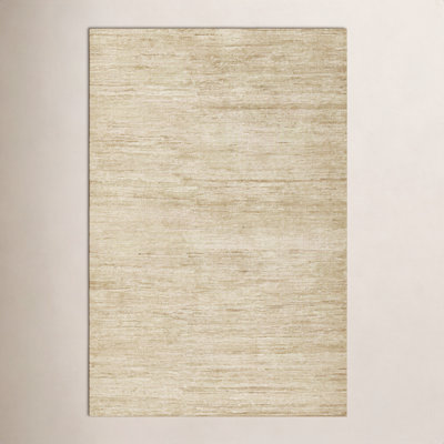 Caterina Abstract Area Rug in Beige