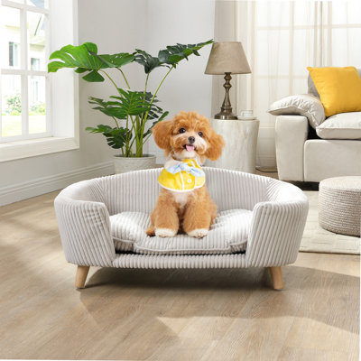 Lit surélevé pour petit chien avec coussin de soutien en mousse, housse en velours côtelé, pieds en bois d'hévéa et assemblage facile
