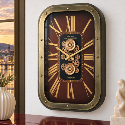 Horloge murale avec engrenages en mouvement de The The Gear