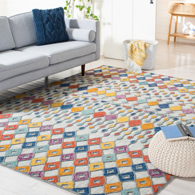 Tapis géométrique en laine / coton touffeté à la main bleu clair / jaune / rouge