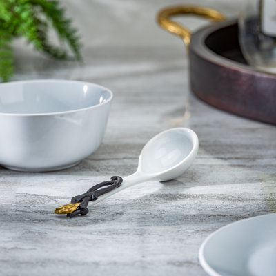 White Stoneware Spoons.