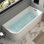 Baignoire de coin autoportante en acrylique autoportante 59 po. X 28,7 po.