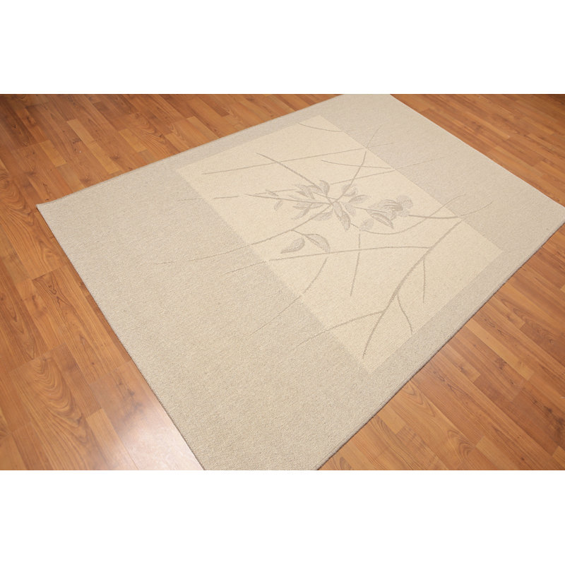 Tapis à aire beige en laine Davies