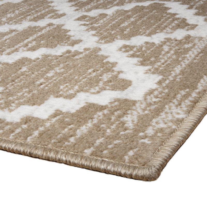 Tapis beige tissé à la machine
