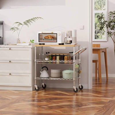 Chariot de cuisine robuste à 3 niveaux avec plateau en bois, chariot utilitaire en métal de qualité commerciale avec poignée et crochets, chariot de rangement pour îlot de service NSF pour la cuisine ou la maison (bois clair et métal)