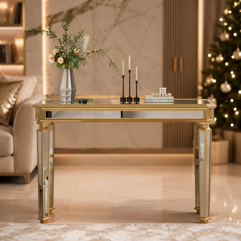 Console miroir vintage en bois sculpté, idéale pour une entrée ou un salon élégant, pour ranger et exposer vos objets de décoration.