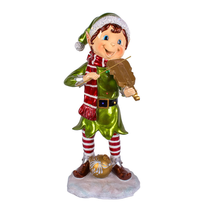 Figurine de peluche jouant un lutin