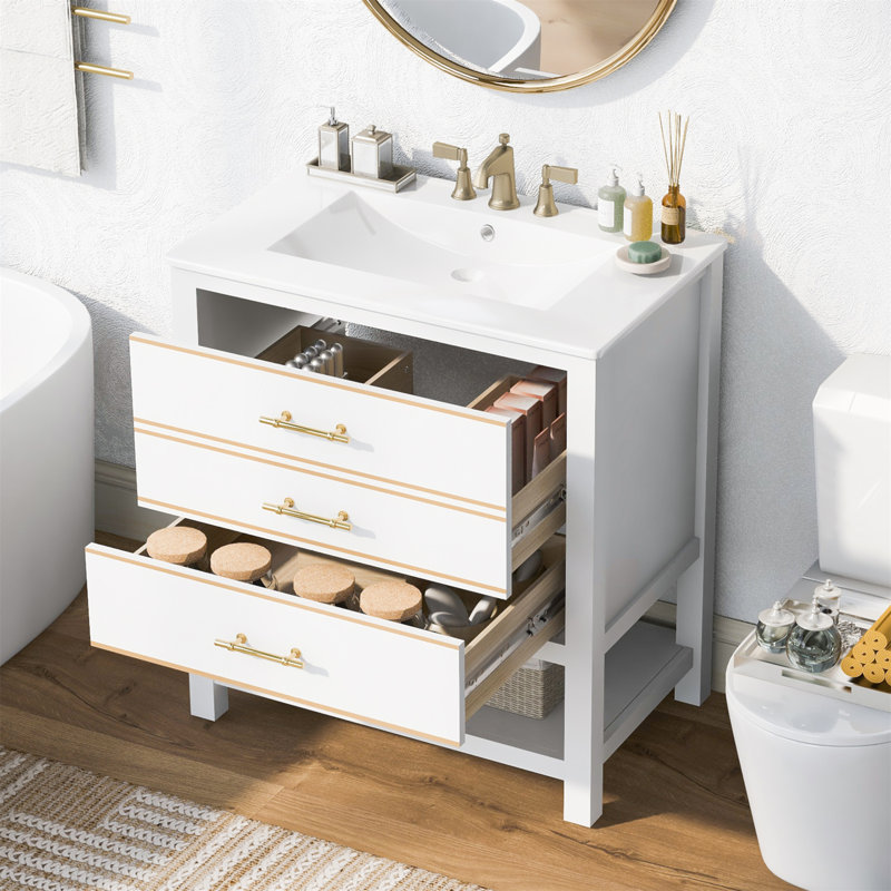 Meuble-lavabo moderne de 30 po bleu marine / blanc avec rangement ouvert et deux tiroirs, idéal pour les salles de bain organisées et élégantes.
