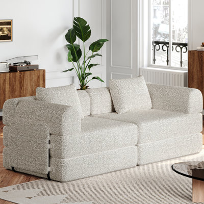 Canapé-lit convertible avec poches et coussins de rangement latéraux, idéal pour les salons, les chambres à coucher et les bureaux, confortable et pliable