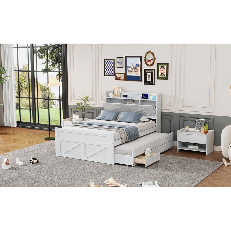 Lit double en bois avec tête de lit et prises de courant offrant confort, économie d'espace et commodité pour un sommeil réparateur