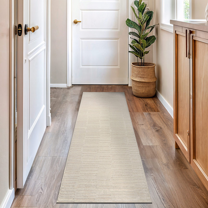 Tapis d'intérieur à poils longs et doux, tissé à la machine, blanc perle, à texture horizontale et à chevrons., Blanc