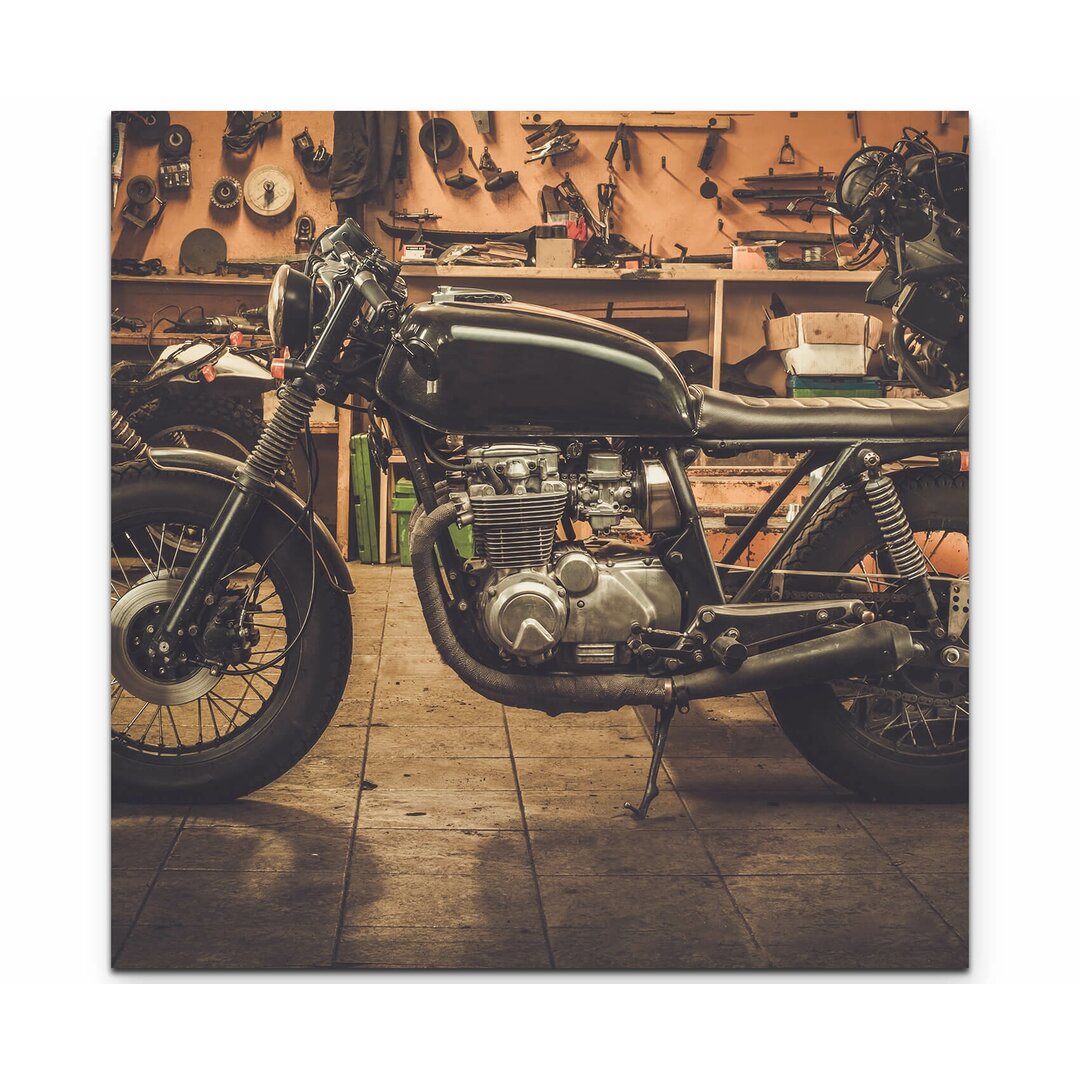 Leinwandbild Cafe Racer Motorrad in Garage