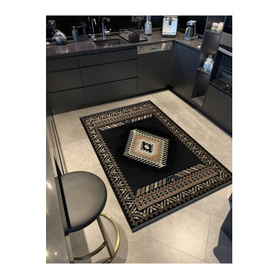 Tapis décoratif noir à motif frangé noir