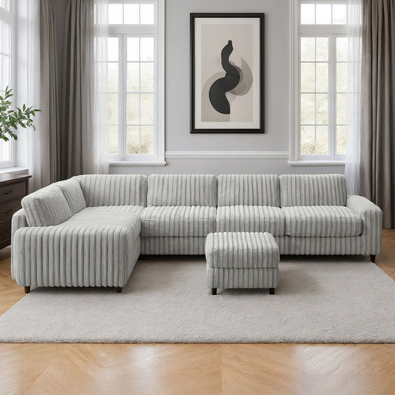 Canapé modulaire en tissu à 4 places avec repose-pieds Lirien