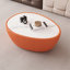 Table basse moderne en cuir de couleur orange avec œufs d'oie-1717801192