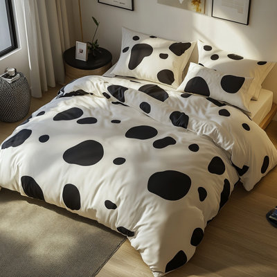 Literie moderne noire à pois blancs