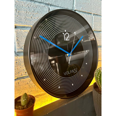 Elegant Decorative Wall Clock, 11.8 inches Diameter, Black Plastic Frame, Real Glass Cover, 1.8 inches Thick | Stylish and Functional Home Decor | Perfect for Living Room, Bedroom, and Office Spaces