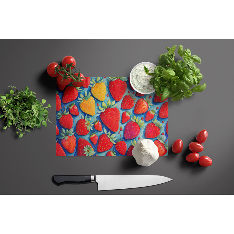 Grande planche à découper en verre avec fraises colorées