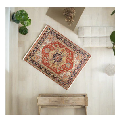 Tapis rouge en laine noué à la main