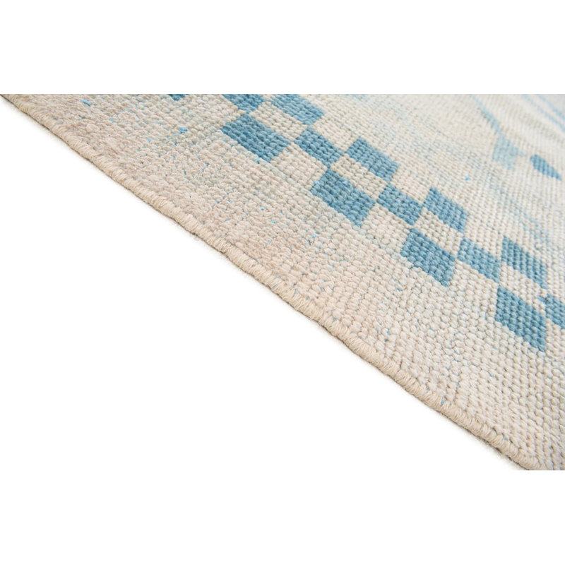 Tapis ivoire Kalmanovitz