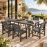 Ensemble de salle à manger d'extérieur 7 pièces en PEHD comprenant 6 fauteuils et une table rectangulaire avec trou pour parasol de 5 cm.